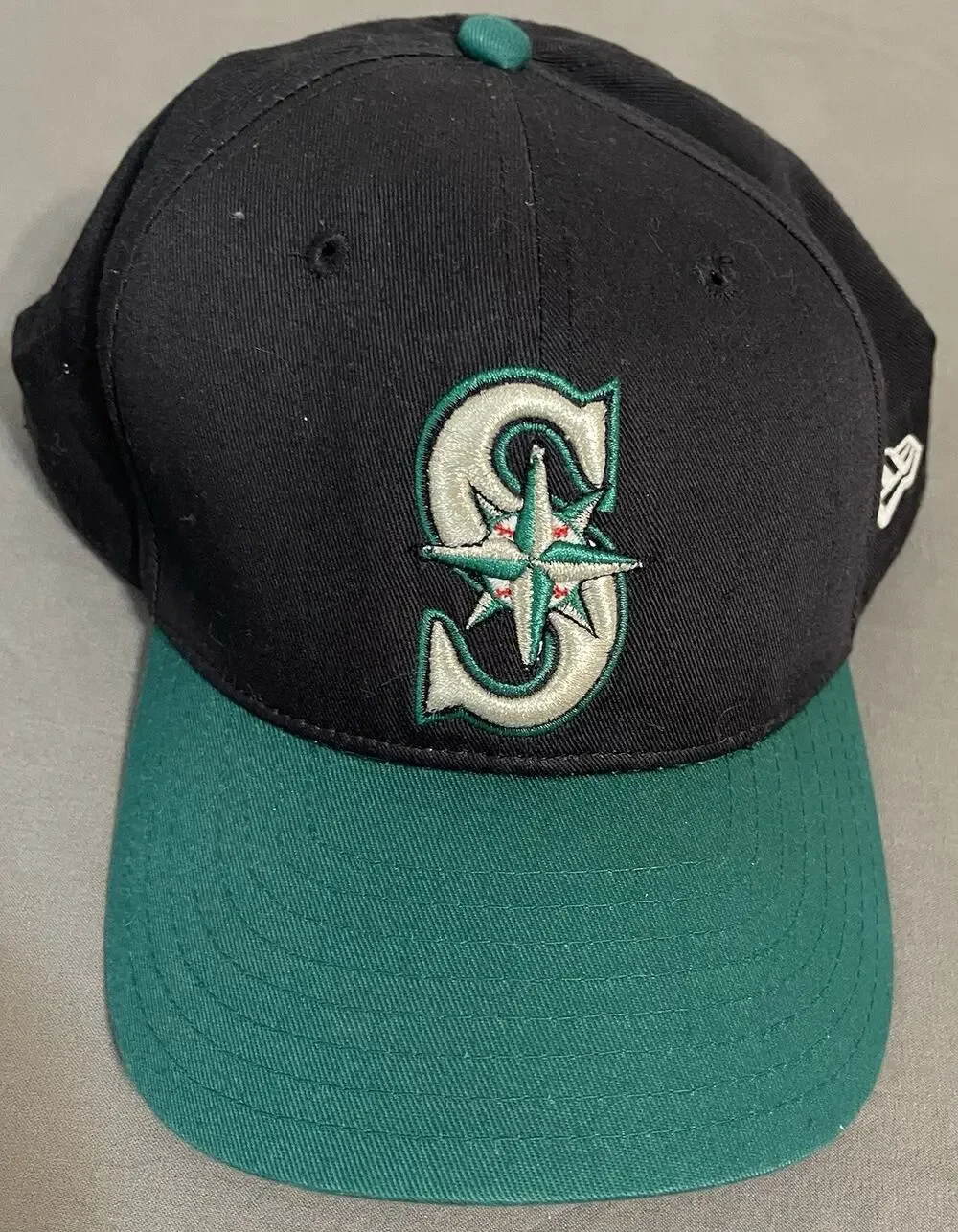 Seattle Mariners New Era Snapback Hat Black Teal Compass Logo Adult